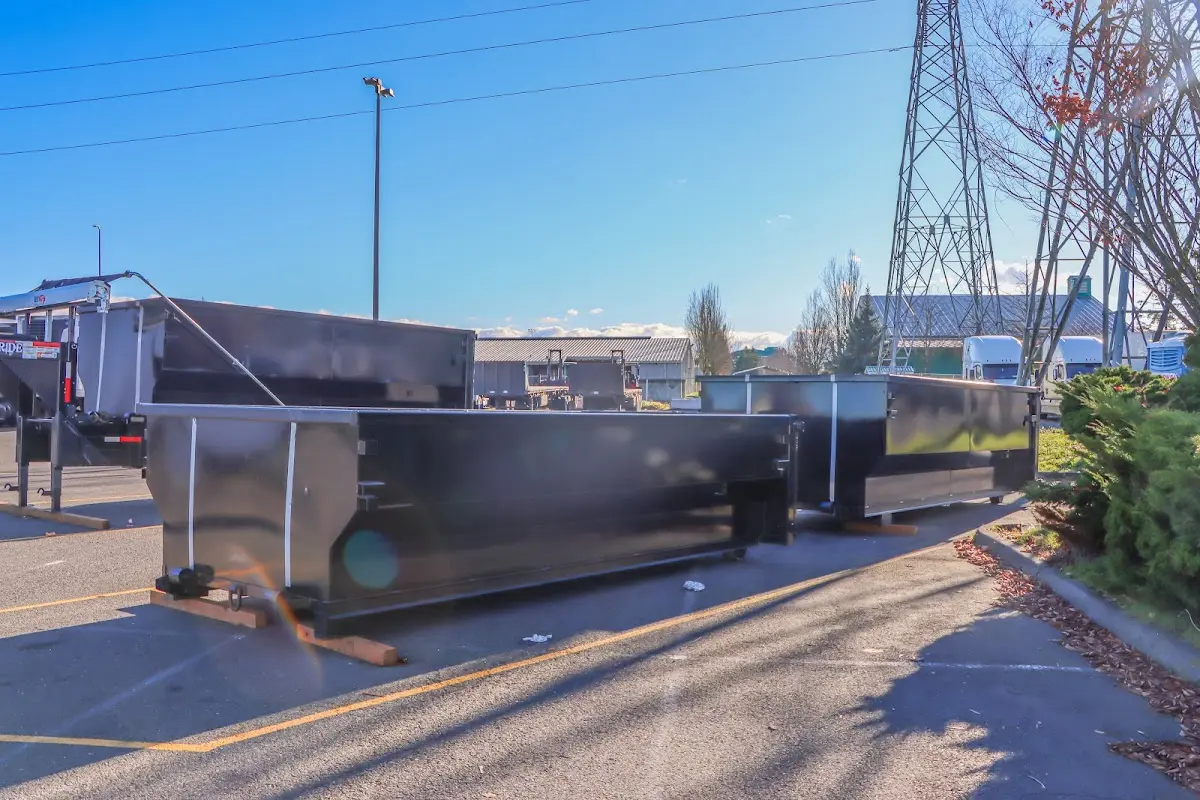 Roll-off dumpster ready for waste disposal at job site for 20 Yard Dumpster Rental in Troy